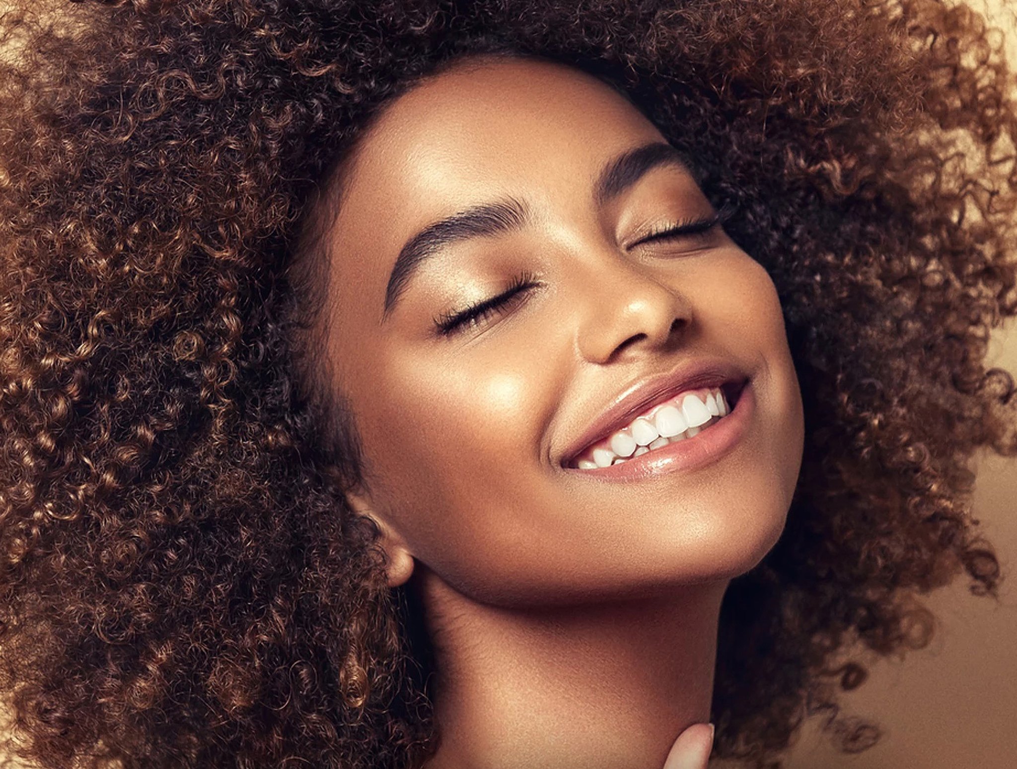 Young woman with beautiful, healthy and glowing skin after led light treatment