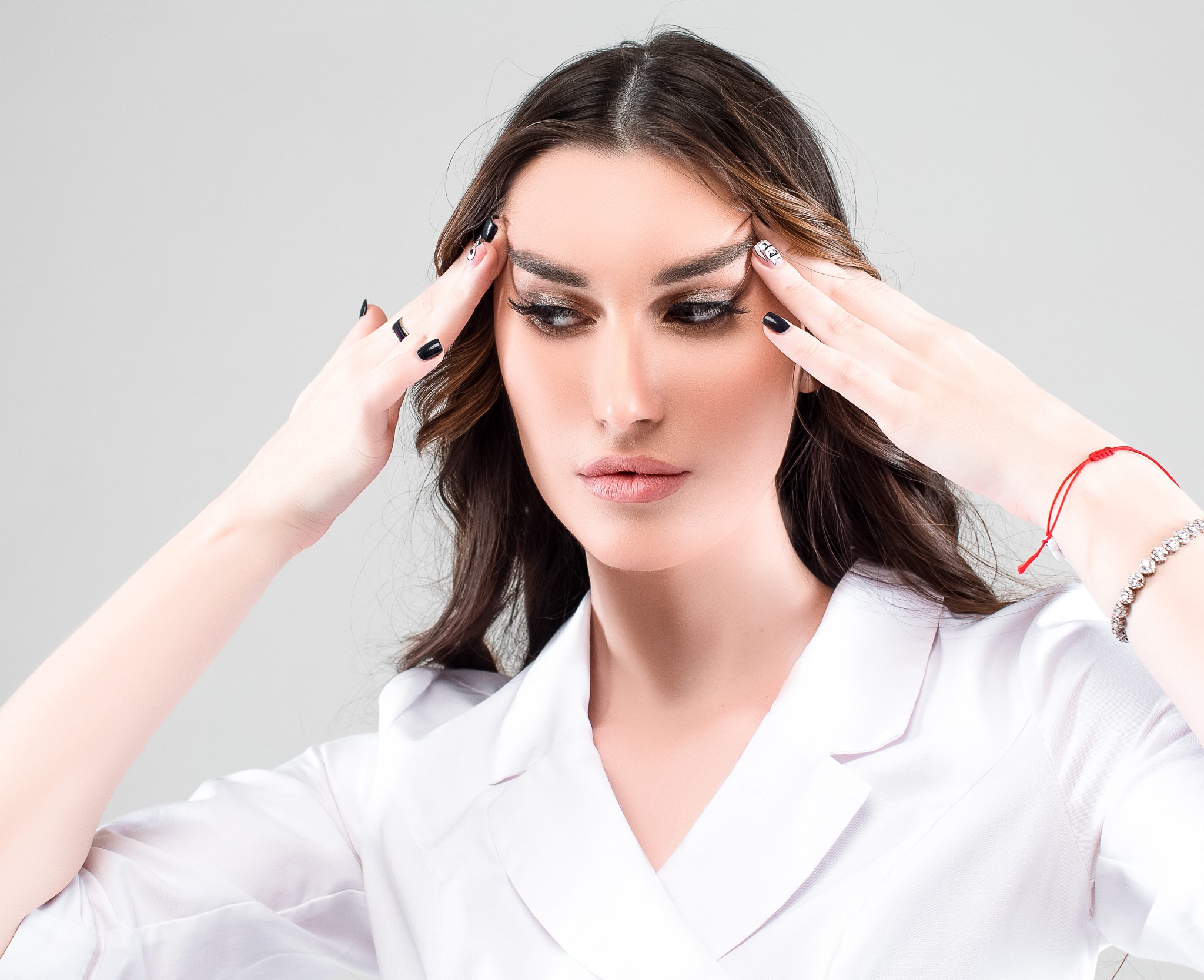 woman showing the effects of a fox eyes lift